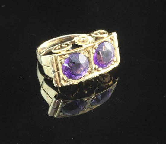 A 14ct gold and amethyst dress ring, size M.